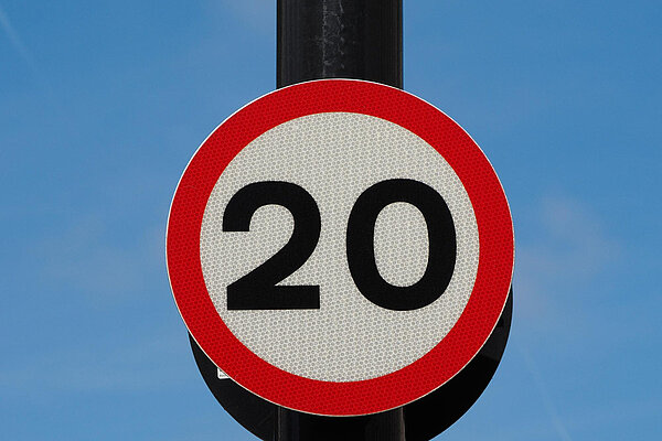 Twenty miles per hour speed sign.