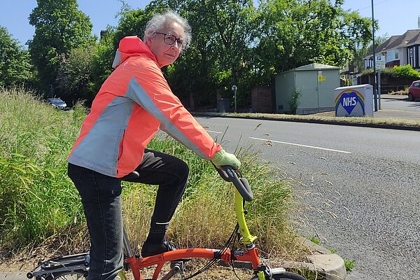 For short journeys Lucy cycles to reduce her impact on the environment Lucy Care on her bicycle